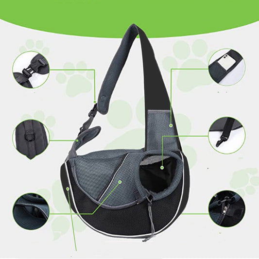 Gray pet carrier bag with black straps on a green and white background