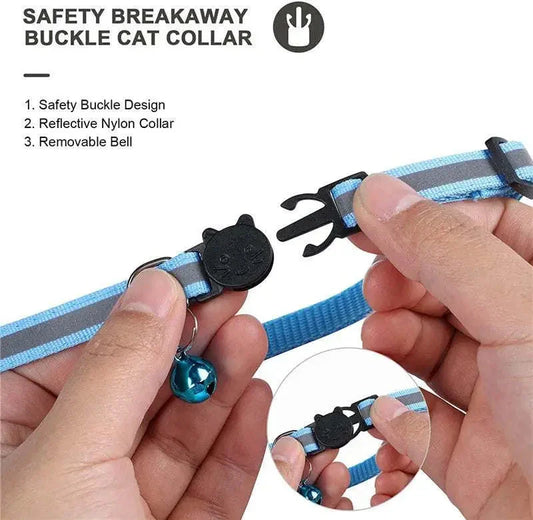 Safety breakaway buckle blue cat collar with reflective nylon and removable bell, held by hands.