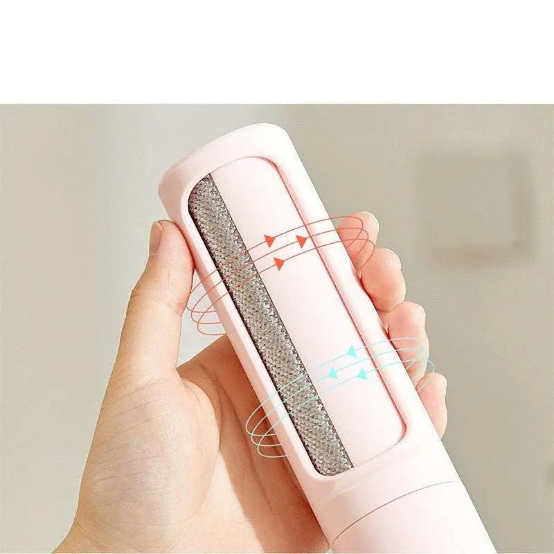 Pawssibly Pets reusable pet hair remover in pink held in hand for grooming and hygiene