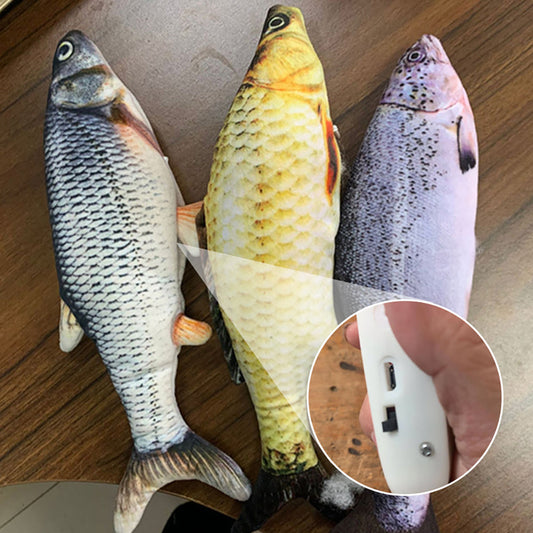 Three fish-shaped plush toys on a wooden surface with an inset showing a USB port.