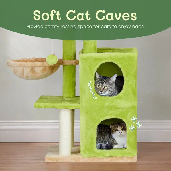 Green cat tree tower with soft cat caves and two cats inside, on a plain background.
