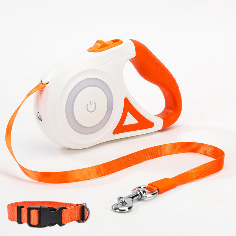 Retractable dog leash and collar set with orange and white design on a white background