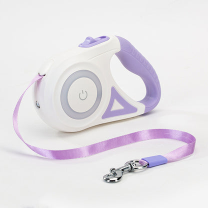 Retractable dog leash with white and purple design on a light gray background