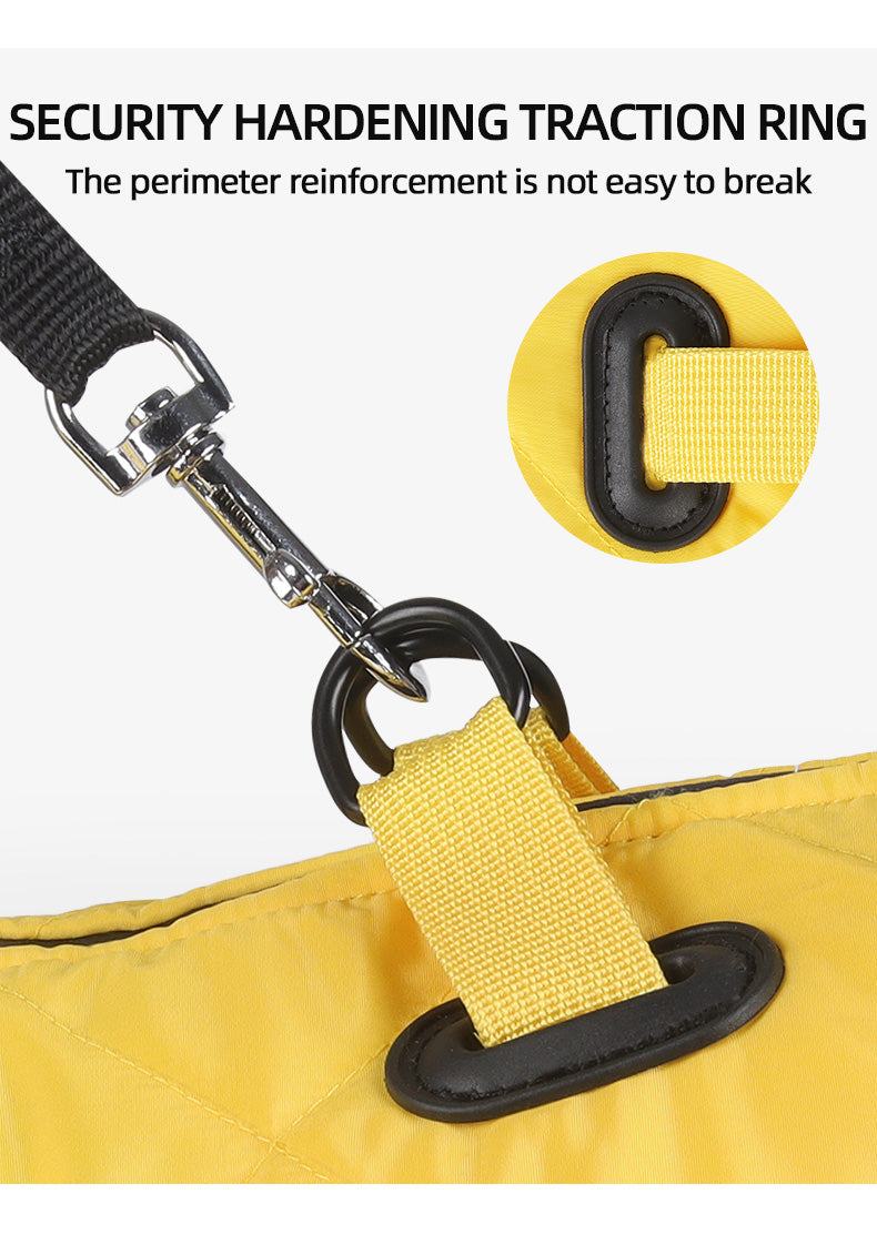 Yellow bag with security hardening traction ring and strap, emphasizing durability of a dog winter coat.