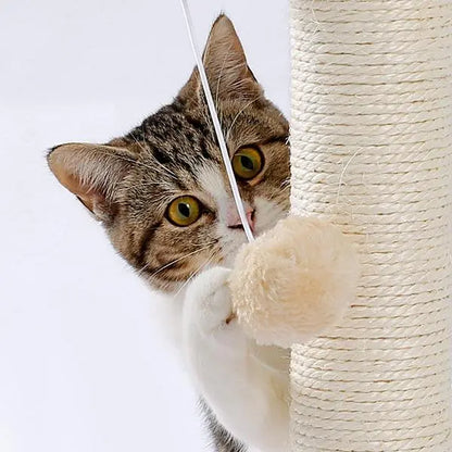 Cat playing with durable cat scratching board by Pawssibly Pets featuring a hanging fluffy toy