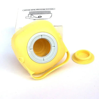 Yellow silicone dog bath brush with handle by Pawssibly Pets for pet grooming and hygiene